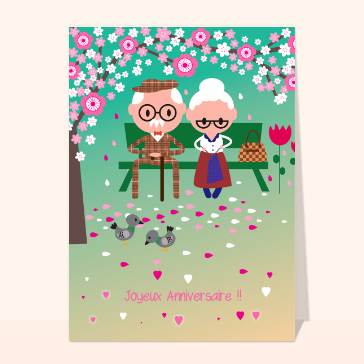 Vieux couple sous un cerisier fleuri
